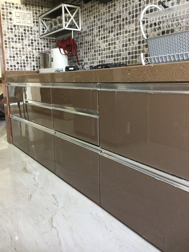 Modular Kitchen in Acrylic Finish - shutters + Baskets