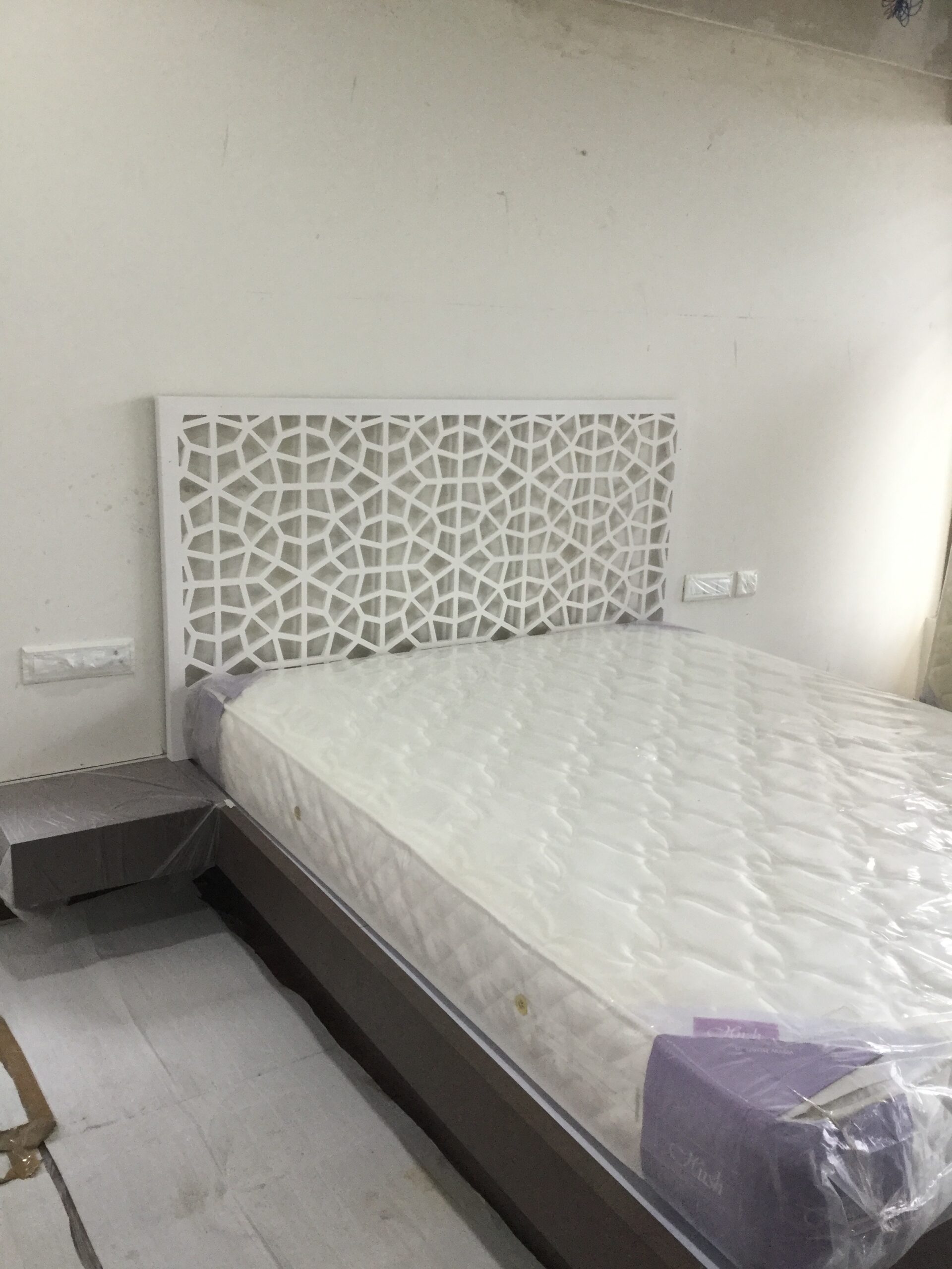 white bed with acrylic cnc